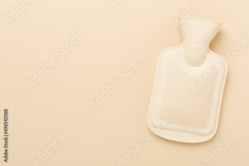 Rubber water warmer bag on color background