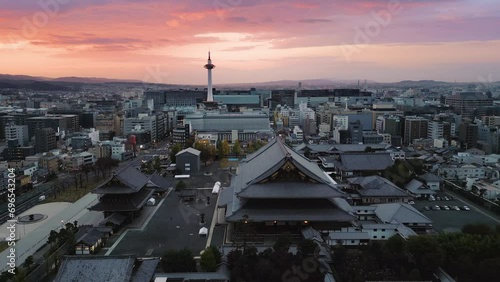 kyoto city skyline aerial view drone at sunrise,higashi hongan ji temple with tower in the background photo