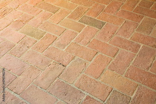 Typical old tuscany terracotta floors called a herringbone pattern due to its particular shape - Italy