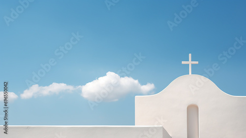 Minimalist church somewhere in the Mediterranean against a blue sky with clouds photo