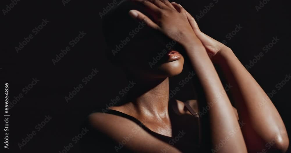 Face, hands and beauty with a natural black woman on a dark background in studio for feminine wellness. Arms, skincare and aesthetic with a confident model touching her body or skin in satisfaction Face, hands and beauty with a natural black woman on a dark background in studio for feminine wellness. Arms, skincare and aesthetic with a confident model touching her body or skin in satisfaction