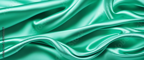 Elegant Turquoise Satin Silk Background Banner - Smooth, Shiny and Wave-Patterned with Soft Ripple, Ideal for Website Headers and Wide Panoramic Designs