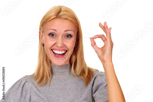 Smiling woman shows ok sign, isolated