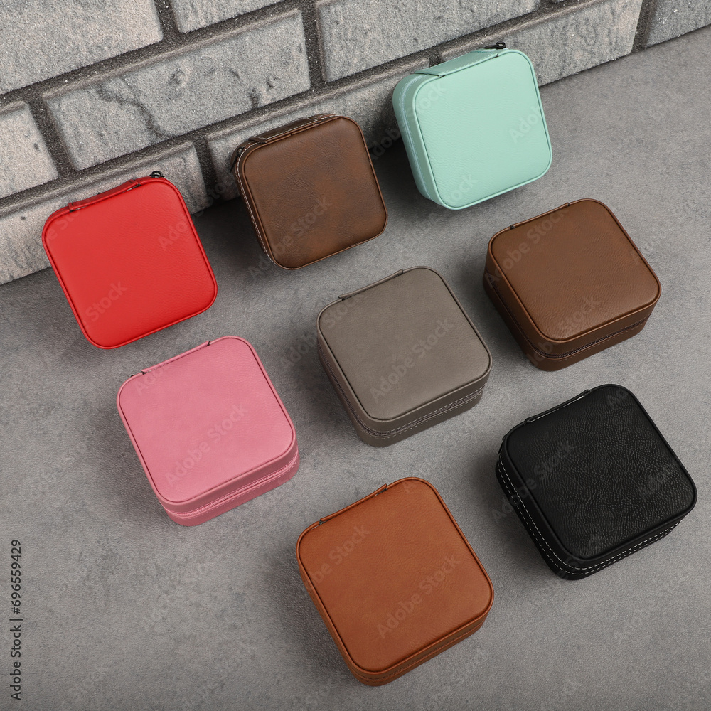 Diffirent colors leather jewelry box. Concept shot, top view. Custom background jewelry box view. Jewelry box and accessories. Diffirent colors leather jewelry box. Concept shot, top view. Custom background jewelry box view. Jewelry box and accessories.