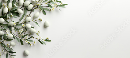 Flat lay easter composition with a willow branch and eggs on white background with copy space. Happy Easter mockup concept