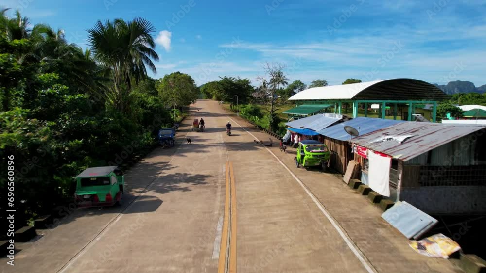 Drone following motorbike on Philippines island Drone following motorbike on Philippines island