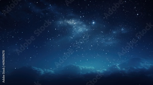  the night sky is full of stars and the clouds are dark blue and there is no image on the page to describe.