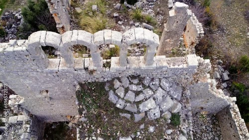 Drone captures Okuzlu's basilica showcasing ancient culture and history Aerial view of Okuzlu reveals rich cultural heritage in its basilica ruins Okuzlu's basilica ruins testament to ancient culture photo