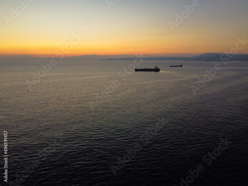 Sunset Over the Ocean with Ships