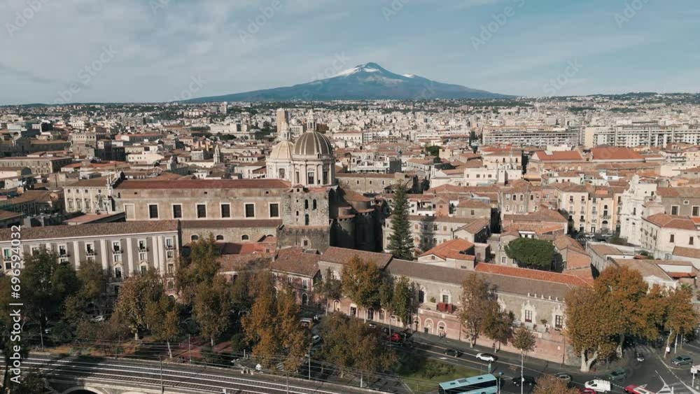 View of the city of Catania with the Etna volcano View of the city of Catania with the Etna volcano