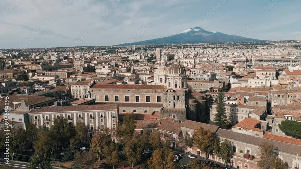 View of the city of Catania with the Etna volcano View of the city of Catania with the Etna volcano