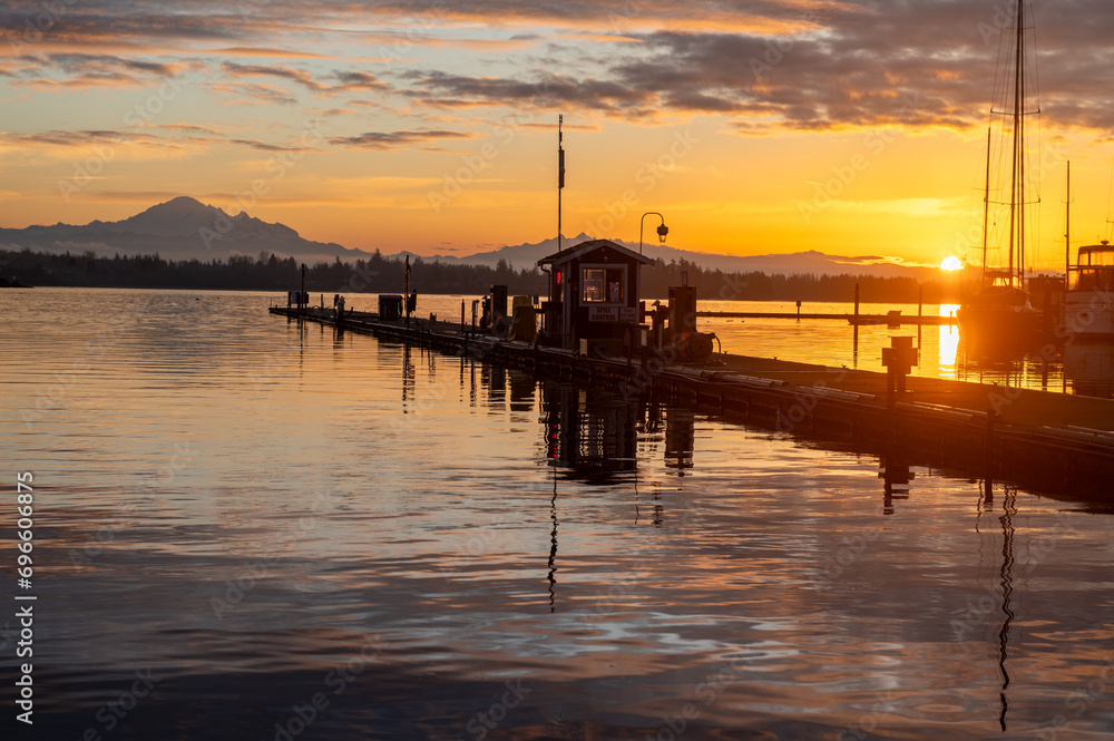 Beautiful sunrise at the Semiahmoo Marina with the majestic Mt. Baker in the background.  Semiahmoo Marina is the Pacific Northwest’s premier resort marina located near Bellingham WA.