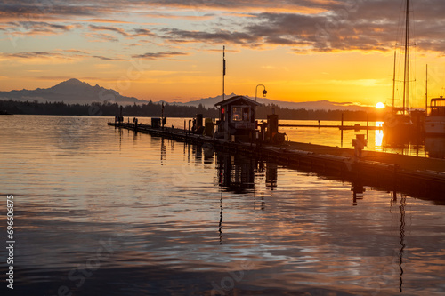 Beautiful sunrise at the Semiahmoo Marina with the majestic Mt. Baker in the background.  Semiahmoo Marina is the Pacific Northwest   s premier resort marina located near Bellingham WA.