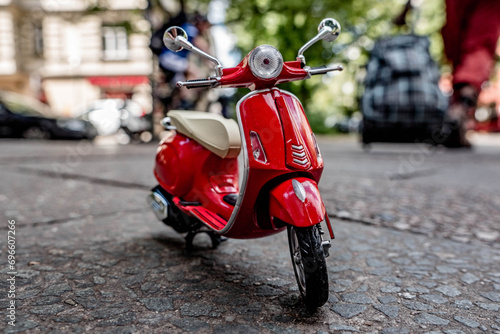 red scooter miniature model