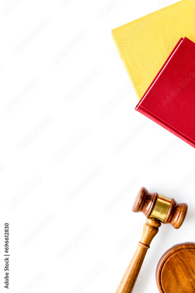 Wooden judge gavel with law book, top view. Law education concept Wooden judge gavel with law book, top view. Law education concept