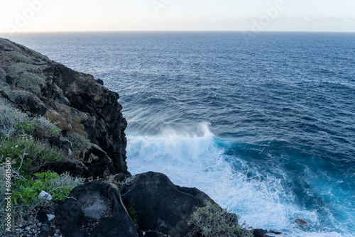 waves crashing on rocks