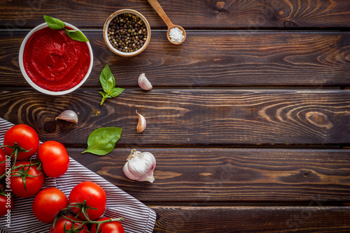 Classic Italian tomatoes sauce passata with basil and garlic for pasta