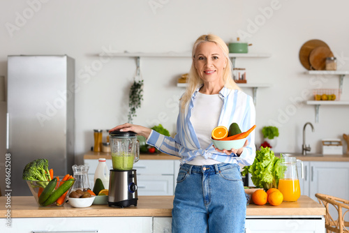 Mature woman making healthy...