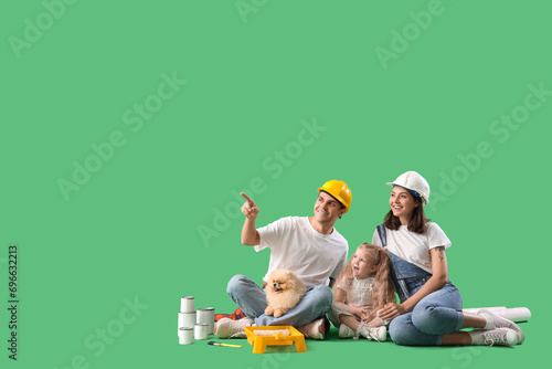 Happy family with repair ma...