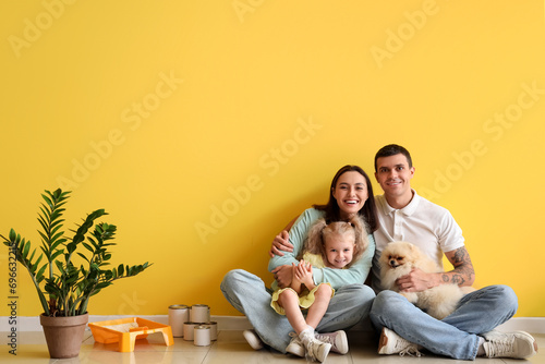 Happy family hugging during...
