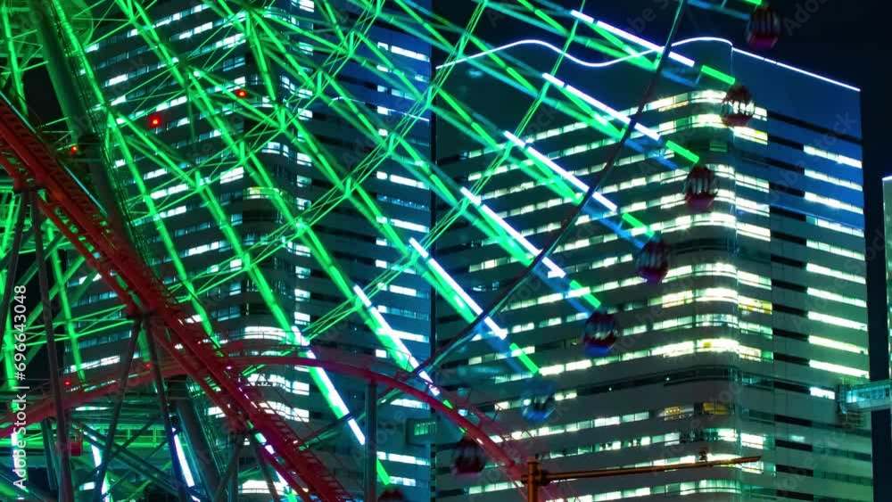 A night timelapse of rotating ferris wheel in Yokohama telephoto shot zoom A night timelapse of rotating ferris wheel in Yokohama telephoto shot zoom