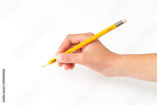 鉛筆を持つ子供の手