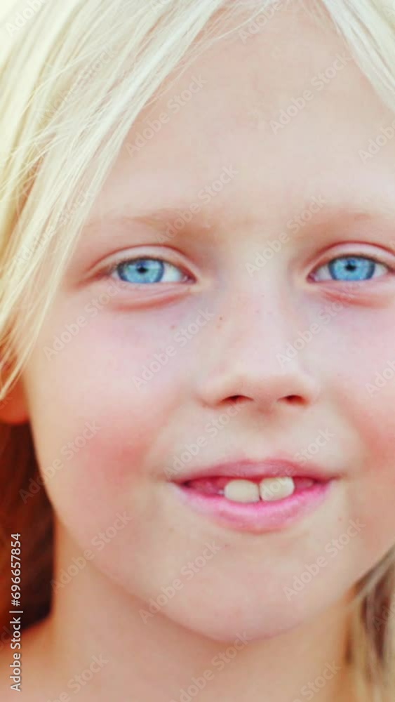 Blonde girl with blue eyes in a wheat field Blonde girl with blue eyes in a wheat field