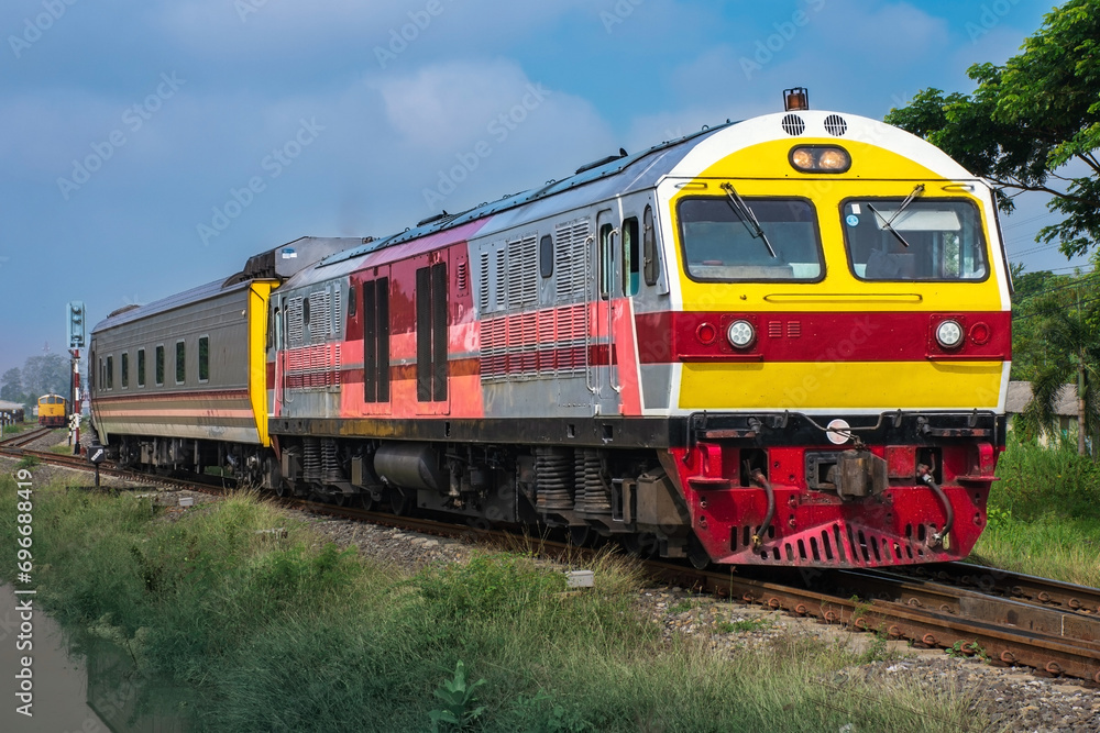 Passenger train by diesel locomotive on the railway. Passenger train by diesel locomotive on the railway.