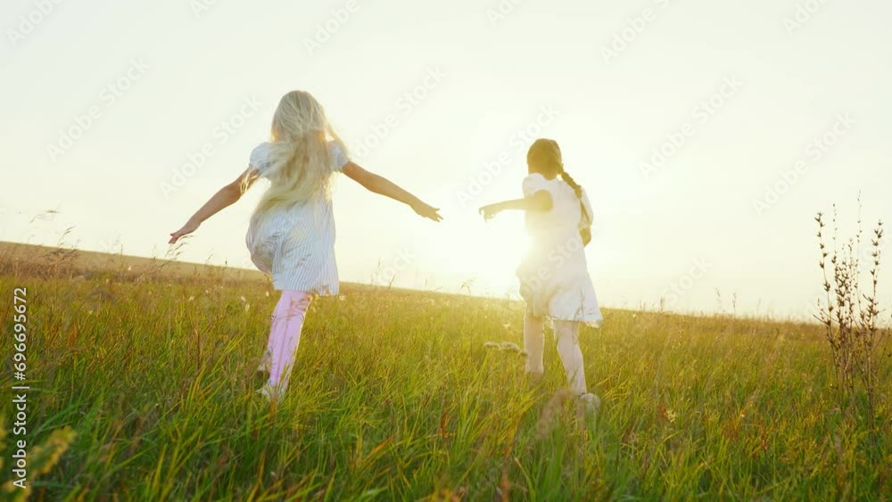 Two cute little girls are running Two cute little girls are running