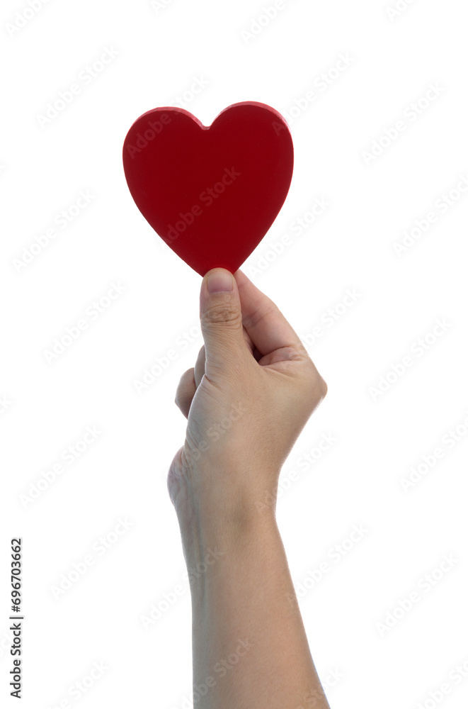 Woman hand holding red heart Woman hand holding red heart