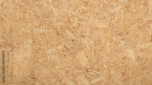 Particle board wooden panel. Warm wooden texture background. Wood texture seamless.