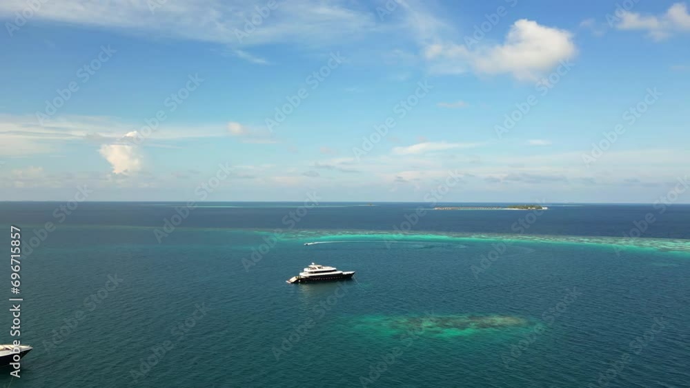 Aerial view of live-aboard dive boats moored at Fasdhoo Lagoon reef, Manta night spot, Maldives, Indian Ocean. Aerial view of live-aboard dive boats moored at Fasdhoo Lagoon reef, Manta night spot, Maldives, Indian Ocean.