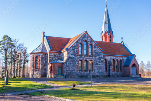 Old beautiful stone Church in the Swedish countryside photo