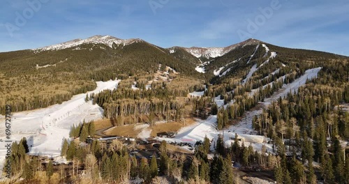 Aerial View of Mountains Partially Covered in Snow. Humphreys Peak in Flagstaff Arizona. photo