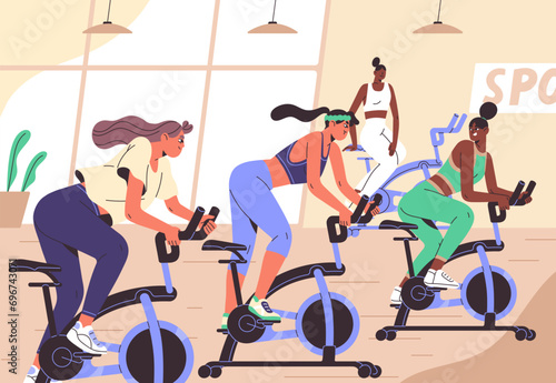 Group fitness training in gym. Multiethnic sportswomen team workout on sport equipment, exercise bike. Slim women do cardio, practice cycling with trainer. Active lifestyle. Flat vector illustration