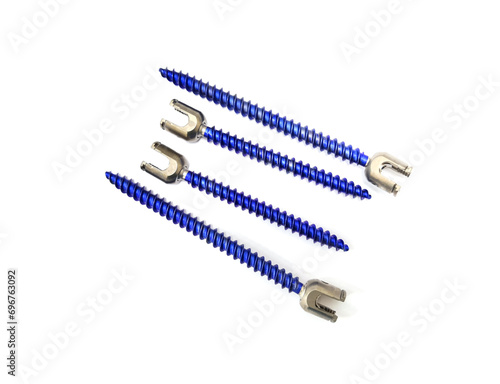 Blue Spinal Pedicle Screws In White Background