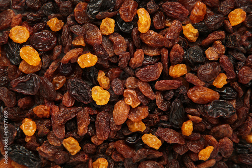 Dried raisins for dessert background. Top view © Mouse family