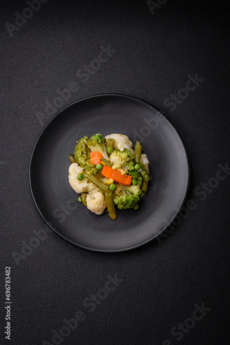 Delicious fresh vegetables steamed carrots, broccoli, cauliflower