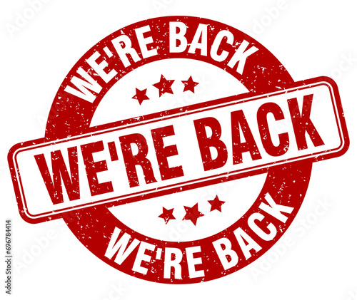 we're back stamp. we're back label. round grunge sign