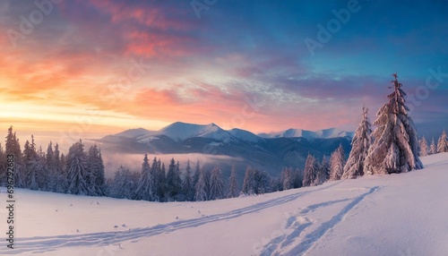 panorama of the winter sunrise in the mountains