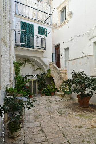 Fototapeta Naklejka Na Ścianę i Meble -  A street of Cisternino, a small town in the Puglia region of Italy.