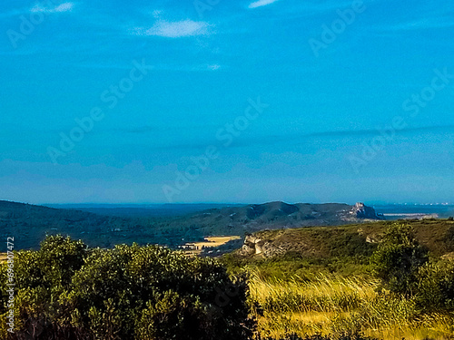 Beautiful landscape of the Eyguières hills on a summer morning from the Orgon plateau