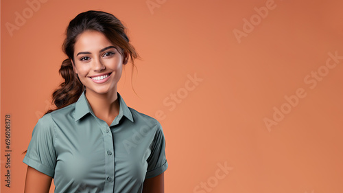 Brunette woman in retail worker uniform smile isolated on pastel background