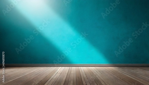 blue turquoise empty wall and wooden floor with interesting with glare from the window interior background for the presentation © Florence