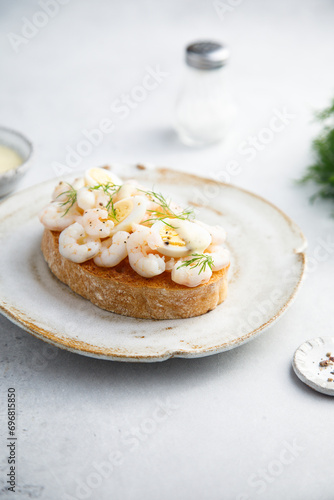 Traditional Scandinavian shrimp sandwich with egg and dill
