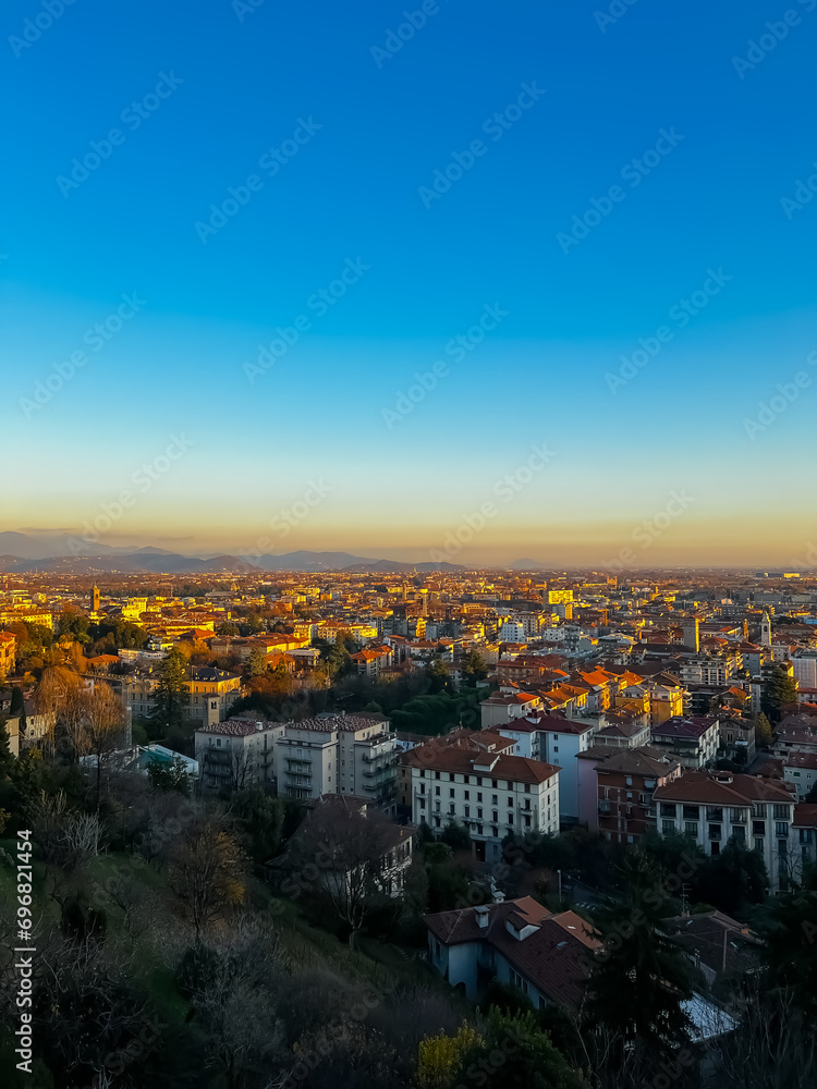 Aerial view of the city of Bergamo at sunset. Bergamo alta, Italy. Vertical shot