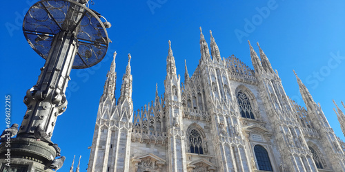 Duomo di Milano: lampione, guglie e statue  photo