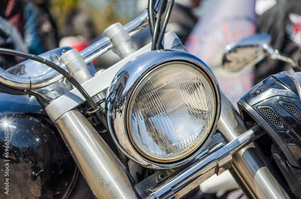 Fototapeta premium chrome shiny chopper motorcycle headlight closeup
