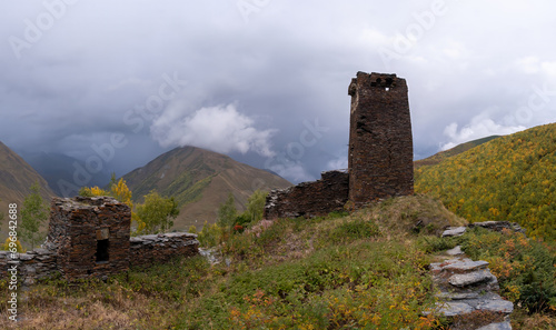 Ruins of a medieval castle in the mountains photo