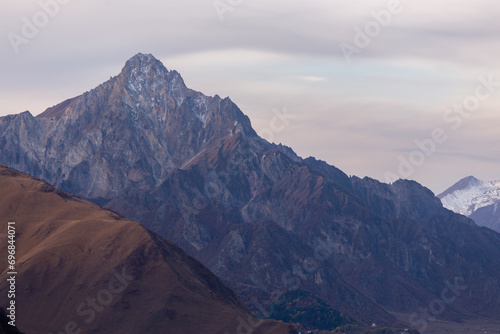 Caucasus mountains at sunset, dramatic landscape